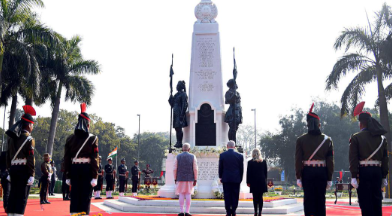 Teen Murti Memorial in New Delhi, India, commemorating Indian soldiers, alongside a depiction of the 1918 Battle of Haifa where Indian cavalry played a key role in World War I.